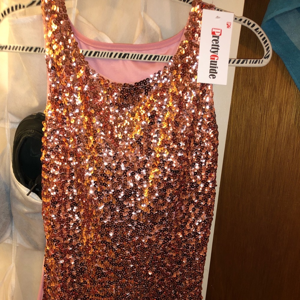 Pink sequined sleeveless top